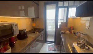 Kitchen in 2 BHK Apartment at Sunteck City Avenue 1, Goregaon West – for Sale