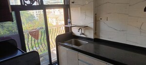 Kitchen in 2 BHK Apartment at MV Labh Samarth Heights, Andheri West – for Sale