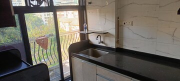 Kitchen in 2 BHK Apartment at MV Labh Samarth Heights, Andheri West – for Sale