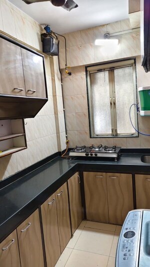 Kitchen in 1 BHK Apartment at Kishor Darshan Apartment, Andheri West – for Rent