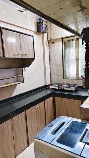 Kitchen in 1 BHK Apartment at Kishor Darshan Apartment, Andheri West – for Rent