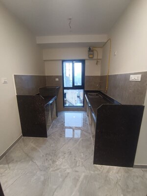 Kitchen in 1 BHK Apartment at Ajmera Boulevard, Malad West – for Rent