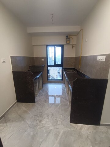 Kitchen in 1 BHK Apartment at Ajmera Boulevard, Malad West – for Rent