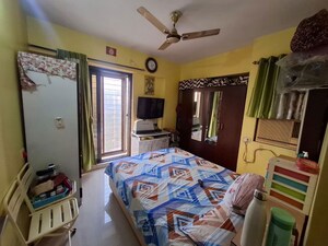Living Room in 2 BHK Apartment at Cosmos County Bella, Ghodbunder Road – for Sale