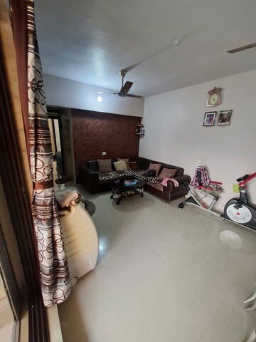 Living Room in 2 BHK Apartment at Cosmos County Bella, Ghodbunder Road – for Sale