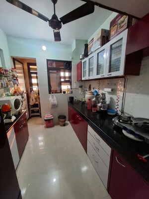 Kitchen in 2 BHK Apartment at Cosmos County Bella, Ghodbunder Road – for Sale