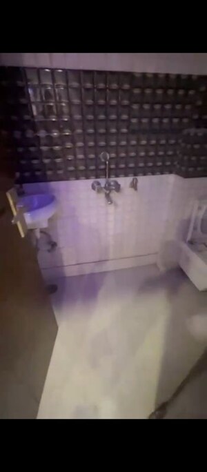 Bathroom in 3 BHK Builder Floor at Dwarka Mor – for Sale