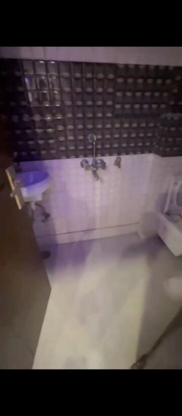 Bathroom in 3 BHK Builder Floor at Dwarka Mor – for Sale