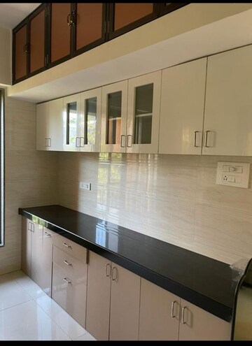 Kitchen in 2 BHK Apartment at Kishor Nagar CHS, Kopri – for Rent