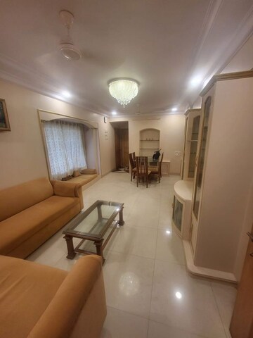 Living Room in 2 BHK Apartment at Arhat Yogiraj CHS, Goregaon West – for Sale