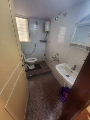 Bathroom in 2 BHK Apartment at Arhat Yogiraj CHS, Goregaon West – for Sale