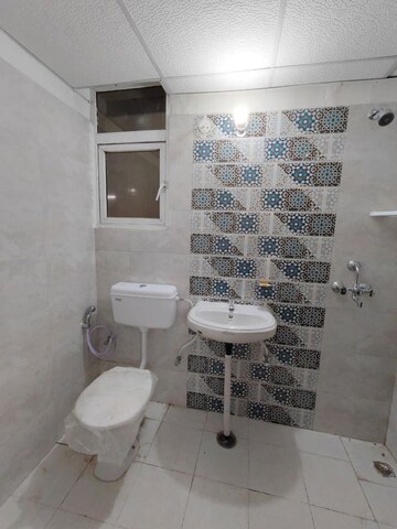 Bathroom in 2 BHK Apartment at MRG The Balcony, Sector 93 – for Rent