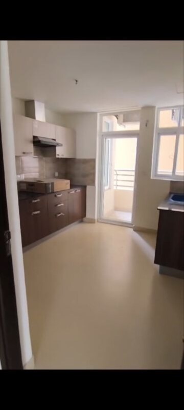 Kitchen in 3.5 BHK Apartment at Wave Amore, Sector 32 – for Sale