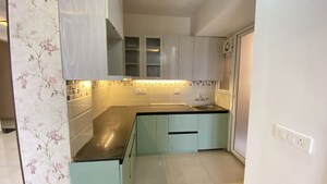 Kitchen in 2 BHK Apartment at Signature Orchard Avenue 2, Sector 93 – for Rent