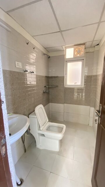 Bathroom in 2 BHK Apartment at Signature Orchard Avenue 2, Sector 93 – for Rent