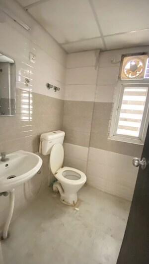 Bathroom in 2 BHK Apartment at Signature Global Orchard Avenue, Sector 93 – for Rent