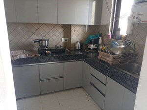 Kitchen in 1 BHK Apartment at Oxirich Sunskriti 2, Sector 33 – for Sale