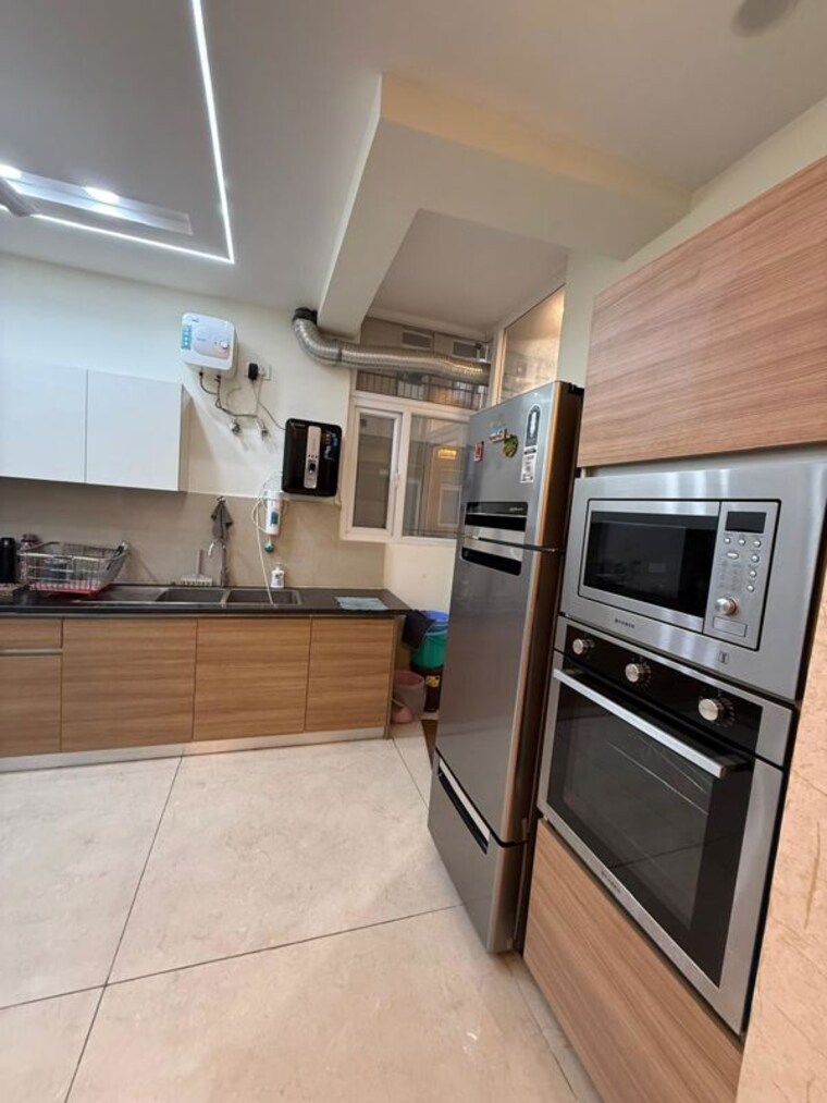 Kitchen, international airport road 3 Bedroom 2100 Sq.Ft. Apartment In International Airport Road Zirakpur 10122481