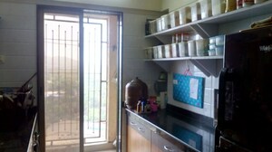 Kitchen in 2.5 BHK Apartment at Madhav Palacia, Ghodbunder Road – for Rent