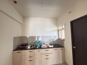 Kitchen in 2 BHK Apartment at Puranik Abitante, Bavdhan – for Rent