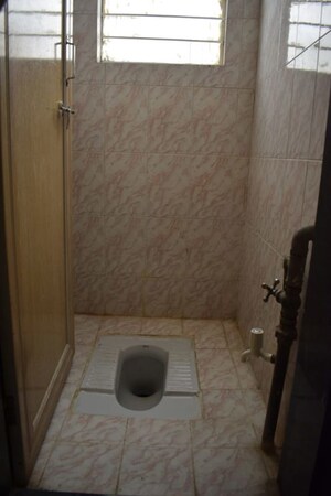 Bathroom in 2 BHK Apartment at Guru Ganesh Nagar Society, Kothrud – for Rent