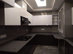 Kitchen in 4 BHK Apartment at Sarvodaya Enclave – for Sale