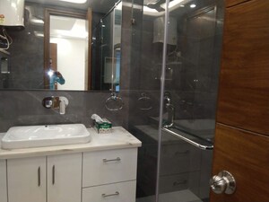 Bathroom in 4 BHK Apartment at Sarvodaya Enclave – for Sale