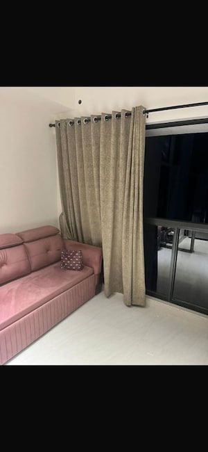 Living Room in 2 BHK Apartment at Lodha Crown Quality Homes, Majiwada – for Rent