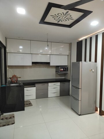 Kitchen in 3 BHK Apartment at Aagam Waves Surat, Choryasi – for Rent
