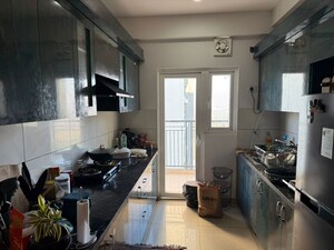 Kitchen in 3 BHK Apartment at Gulshan Botnia, Sector 144 – for Sale