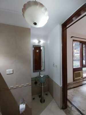 Bathroom in 4 BHK Builder Floor at Ambience Island Lagoon, Sector 24 – for Sale