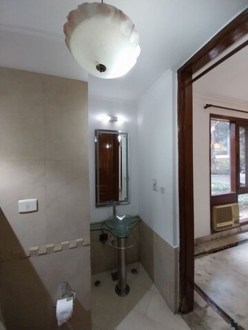 Bathroom in 4 BHK Builder Floor at Ambience Island Lagoon, Sector 24 – for Sale
