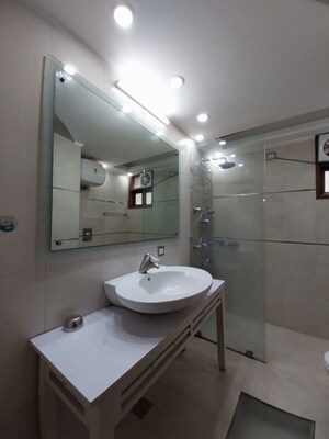 Bathroom in 4 BHK Builder Floor at Ambience Island Lagoon, Sector 24 – for Sale