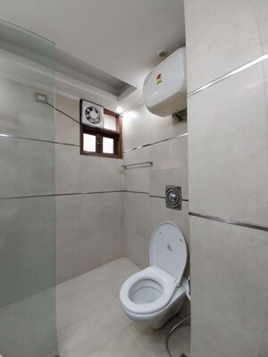 Bathroom in 4 BHK Builder Floor at Ambience Island Lagoon, Sector 24 – for Sale