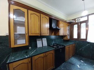 Kitchen in 4 BHK Builder Floor at Ambience Island Lagoon, Sector 24 – for Sale