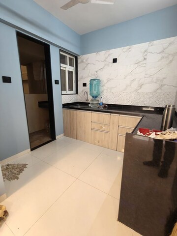 Kitchen in 2 BHK Apartment at Krishna Amorapolis, Dhanori – for Rent