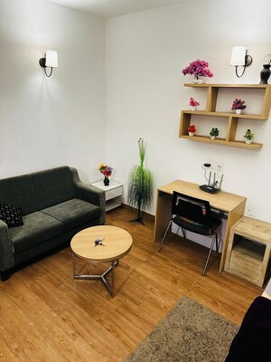 Team Area in 1 RK Apartment at Nimbus The Golden Palm, Sector 168 – for Rent