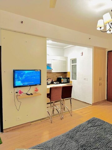 Team Area in Studio Apartment at Nimbus The Golden Palm, Sector 168 – for Rent