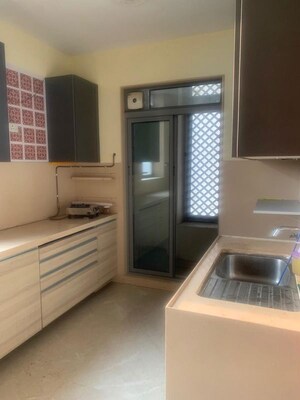 Kitchen in 3 BHK Apartment at Piramal Vaikunth, Balkum Pada – for Rent