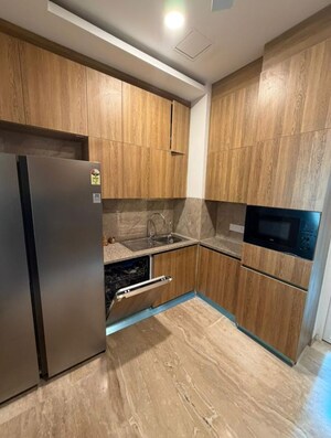 Kitchen in 3 BHK Apartment at Ambience Creacions, Sector 22 – for Rent