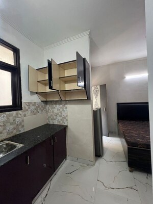 Kitchen in 1.5 BHK Builder Floor at Minarch Tower, Sector 44 – for Rent