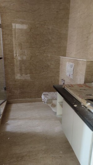Bathroom in 3 BHK Apartment at Ambience Tiverton, Sector 50 – for Sale
