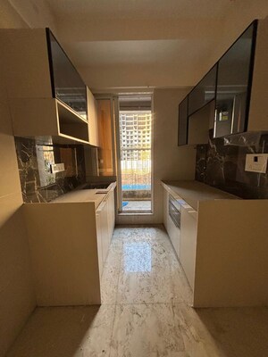 Kitchen in 2 BHK Apartment at Unique Ivana, Mira Road – for Rent