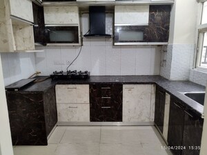 Kitchen in 3 BHK Apartment at ABA Coco County, Sector 10 Greater Noida – for Rent