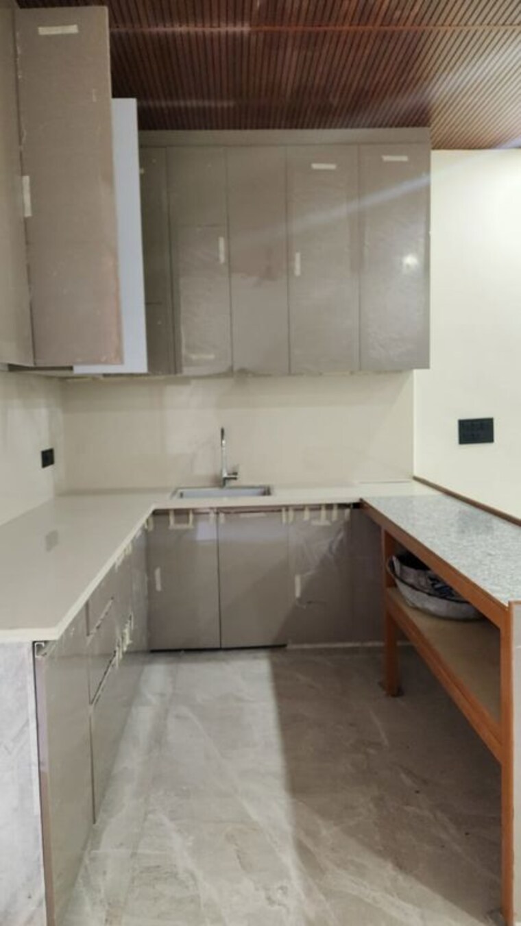 Kitchen, rajouri garden 3 Bedroom 140 Sq.Yd. Builder Floor In Rajouri Garden Delhi 10127743