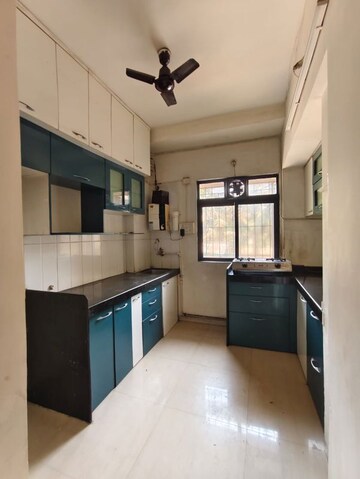 Kitchen in 1 BHK Apartment at Unnathi Woods Phase 1 And 2, Ghodbunder Road – for Rent