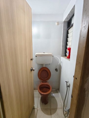 Bathroom in 1 BHK Apartment at Unnathi Woods Phase 1 And 2, Ghodbunder Road – for Rent