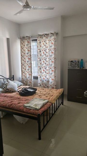 Bedroom in 2 BHK Apartment at Roshan Milestone, Tathawade – for Rent