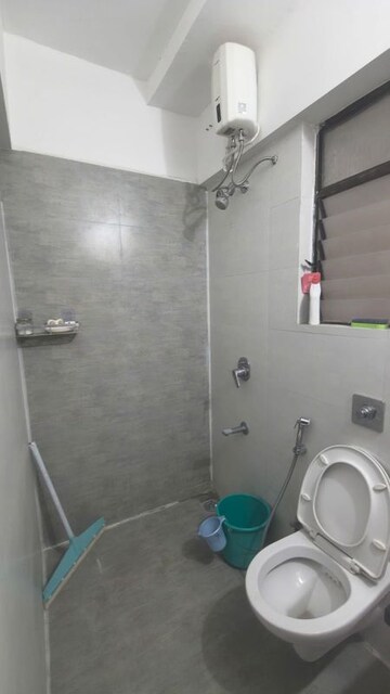 Bathroom in 2 BHK Apartment at Roshan Milestone, Tathawade – for Rent