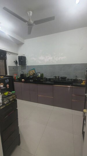 Kitchen in 2 BHK Apartment at Roshan Milestone, Tathawade – for Rent